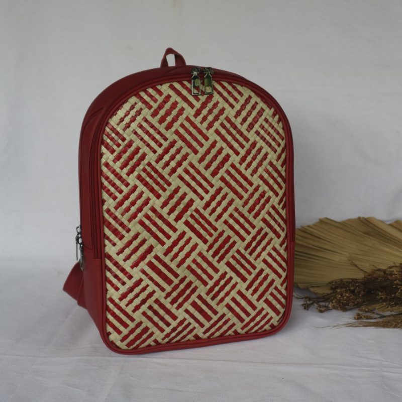 Pandan weave backpack made from intricately woven pandan leaves, offering a natural and eco-friendly design for everyday use. Pandan weave backpack made from intricately woven pandan leaves, offering a natural and eco-friendly design for everyday use.
